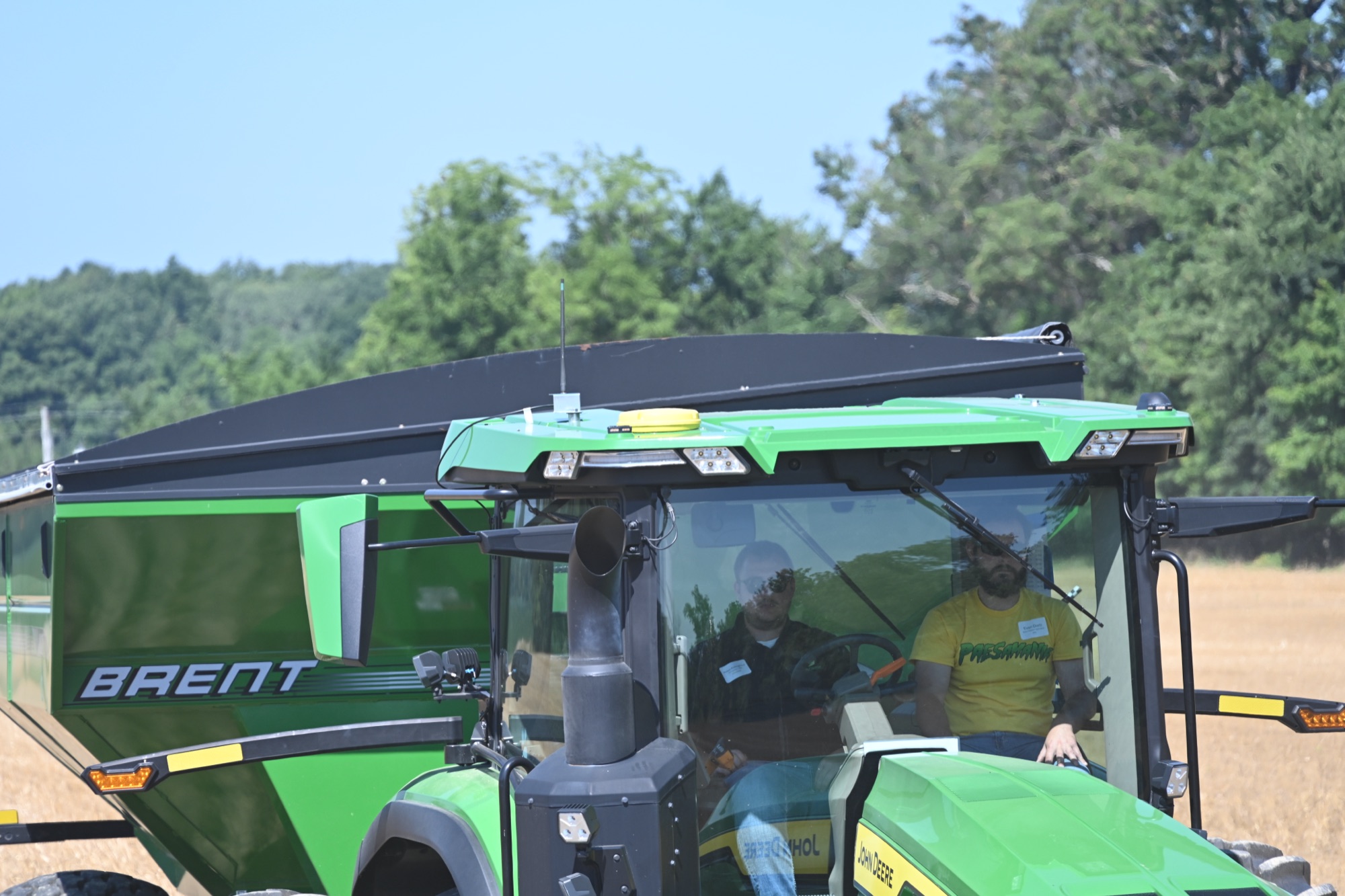 John Deere tractor with a Brent grain cart at a Koenig Equipment field event