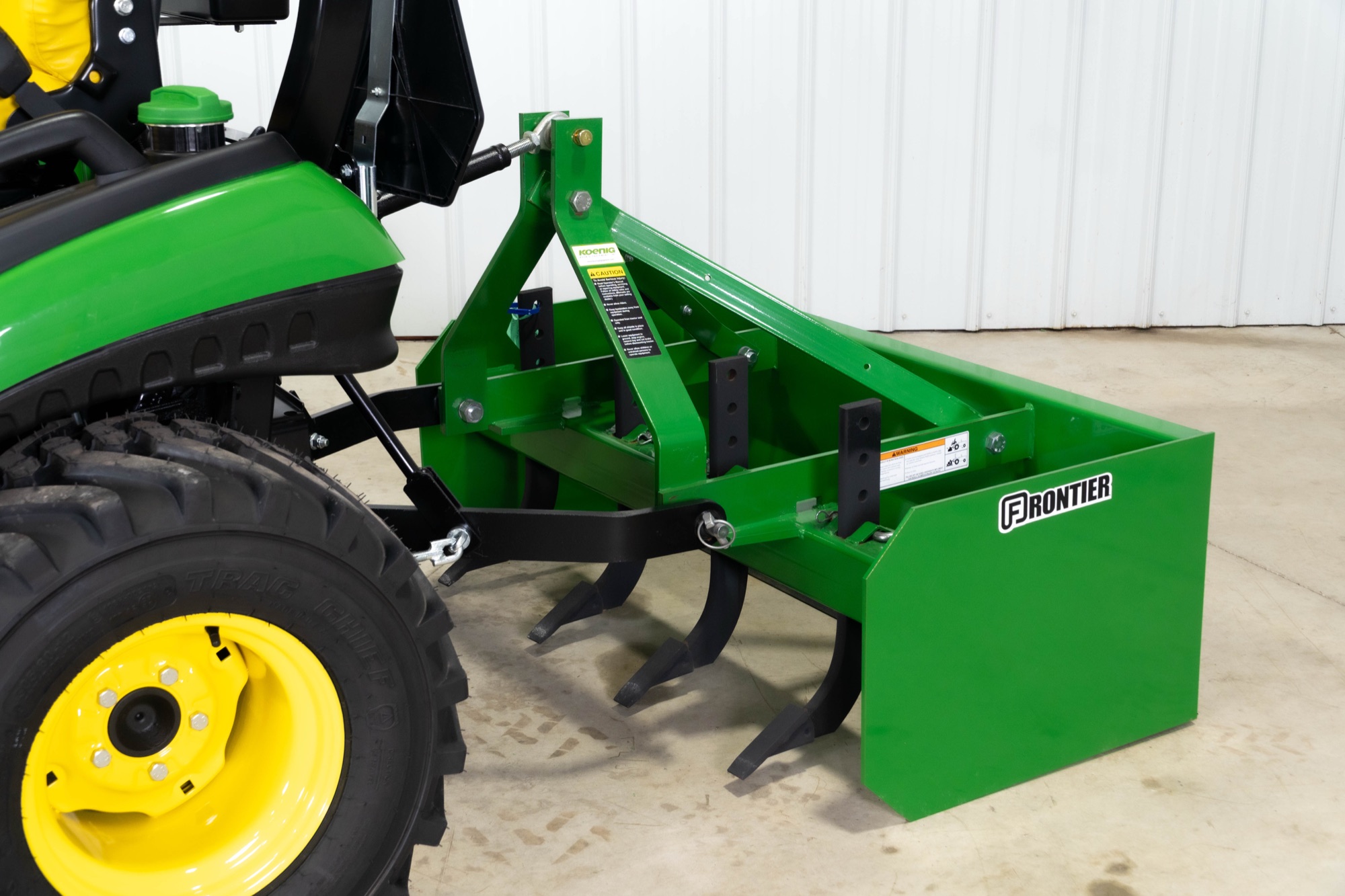Frontier box blade mounted on a John Deere compact utility tractor