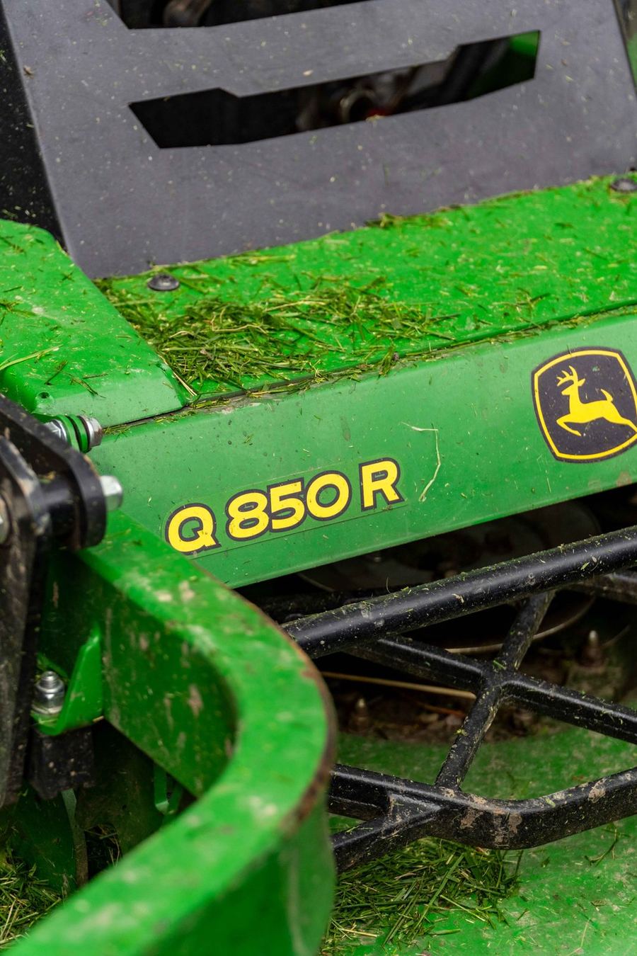 Q850R decal on a John Deere QuikTrak stand-on mower