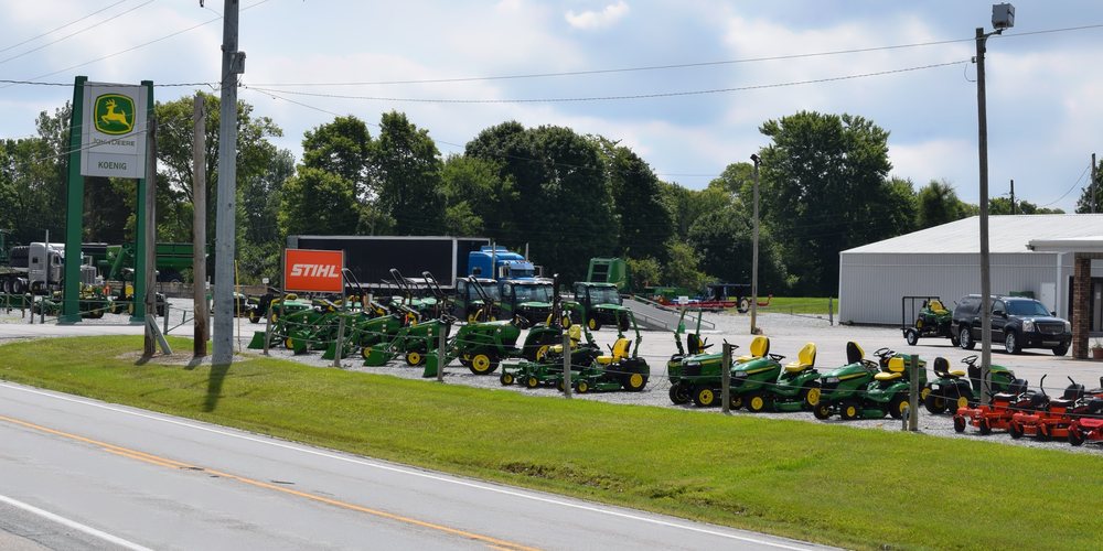 New John Deere mowers and compact tractors on the Koenig Equipment lot in Richmond, Indiana